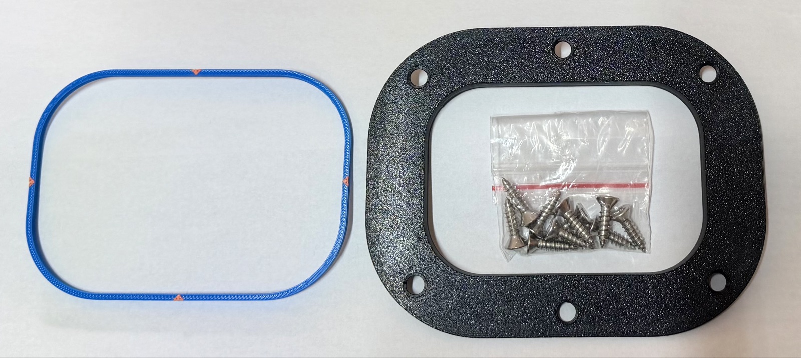 Contents of the box: cutting template, Pro Clean-Fit Inlet and stainless screws